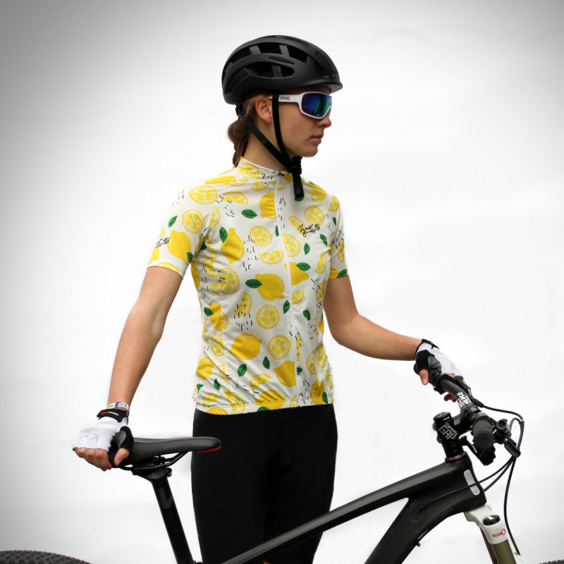 Women's cycling jersey lemon-slice limited series SARA - <ul><li>This original women's cycling jersey was made in Slovakia out of 100% recycled blend of polyester and spandex</li><li> It blocks the wind and is enough breathable</li><li> Full-length zipper fitted design with prolonged stand-up collar and a molded back</li>