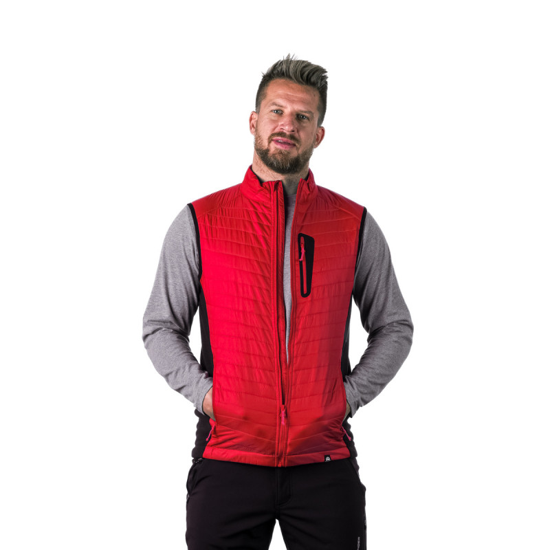 Men's vest universal sports ZAYNA VE-50001OR - <ul><li>The universal hybrid vest of a classic cut is a combination of a wind-resistant front part and a breathable back part made of fleece material</li><li> The combination of materials used allows for universal use in normal use as well as in outdoor activities</li><li> The front part and shoulder parts are insulated with PrimaLoft® Eco Black synthetic filling, with an excellent ratio of thermal insulation properties and weight</li>